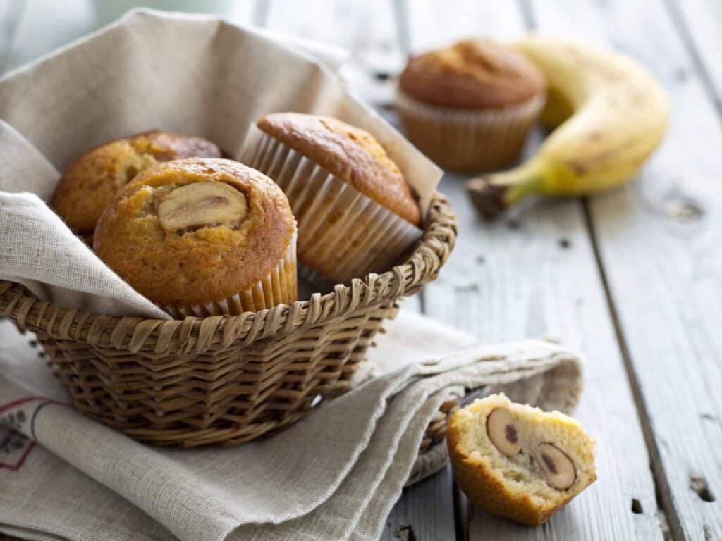 close up of banana muffins recipe in a rustic bask